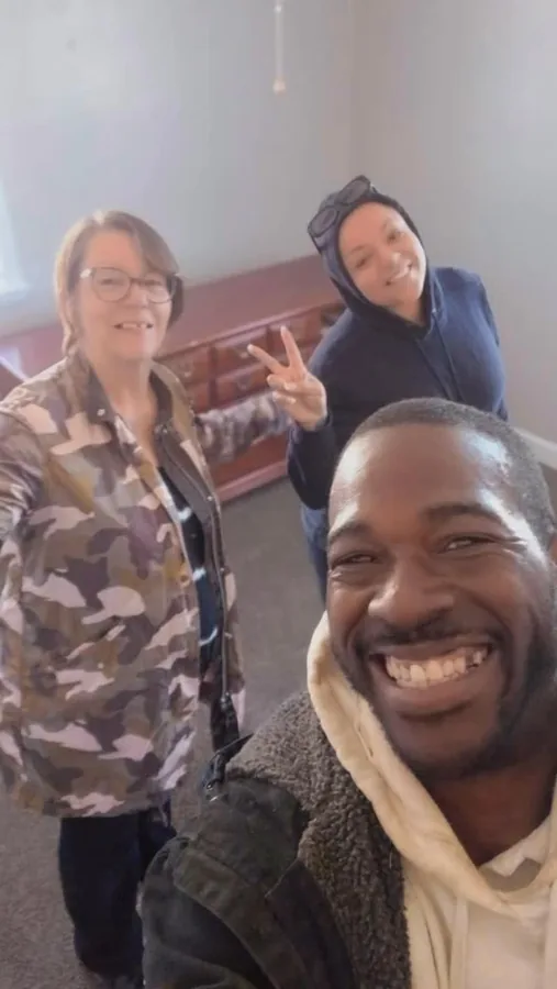 Junkdrop crew and recipients smiling together